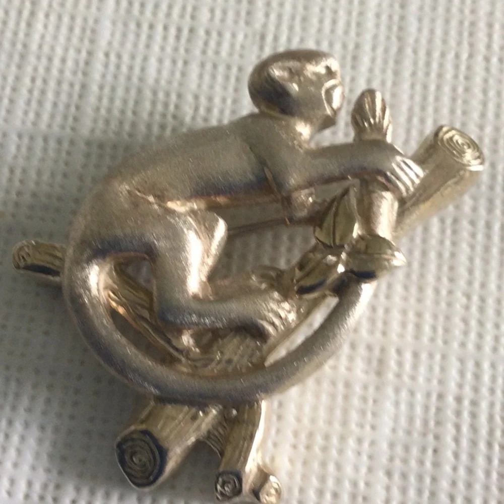 Woman’s Vintage Brooch of a Monkey on a branch made of Sliver
